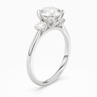 Round Pear Three-Stone with Round Sides in Platinum angled