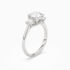 Round Round Three-Stone with Pear Sides in 18K White Gold angled