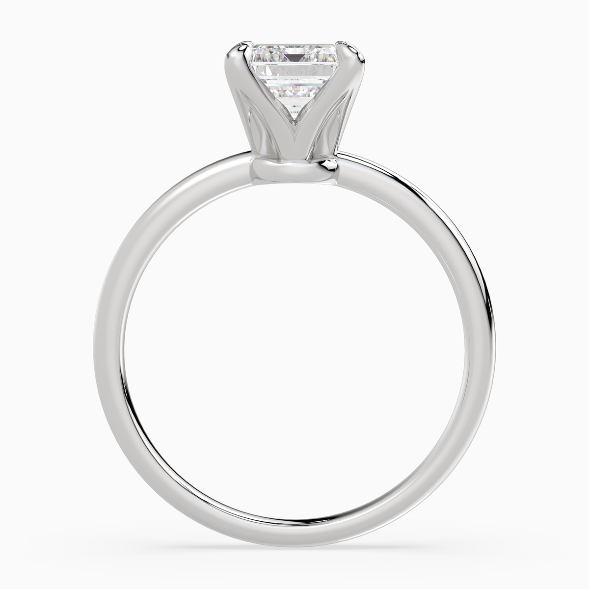 Emerald Petite Classic Solitaire in Platinum side profile