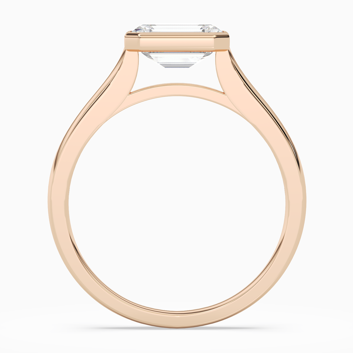 Emerald East-West Bezel Solitaire in 14K Rose Gold side profile