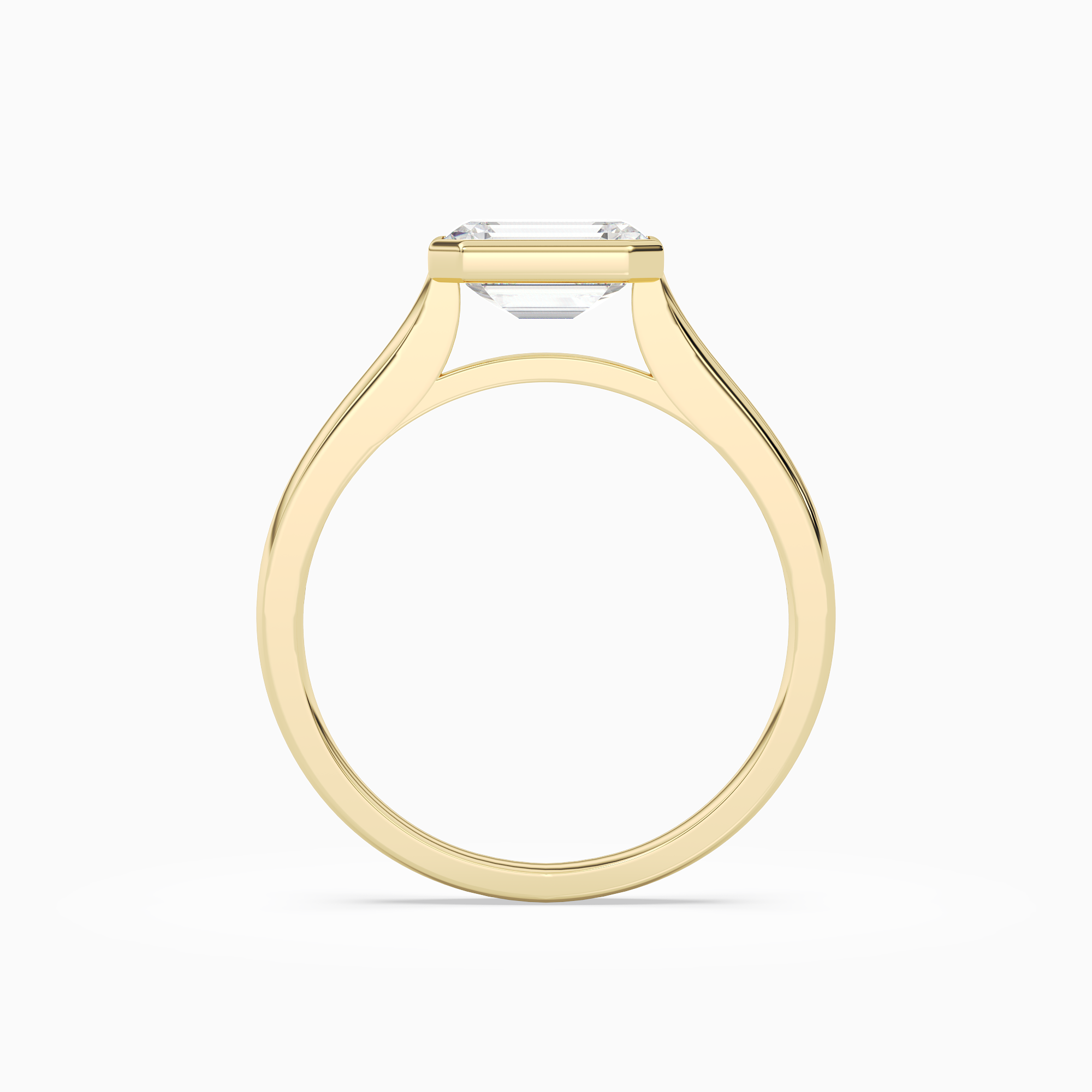 Emerald East-West Bezel Solitaire in 18K Yellow Gold side profile