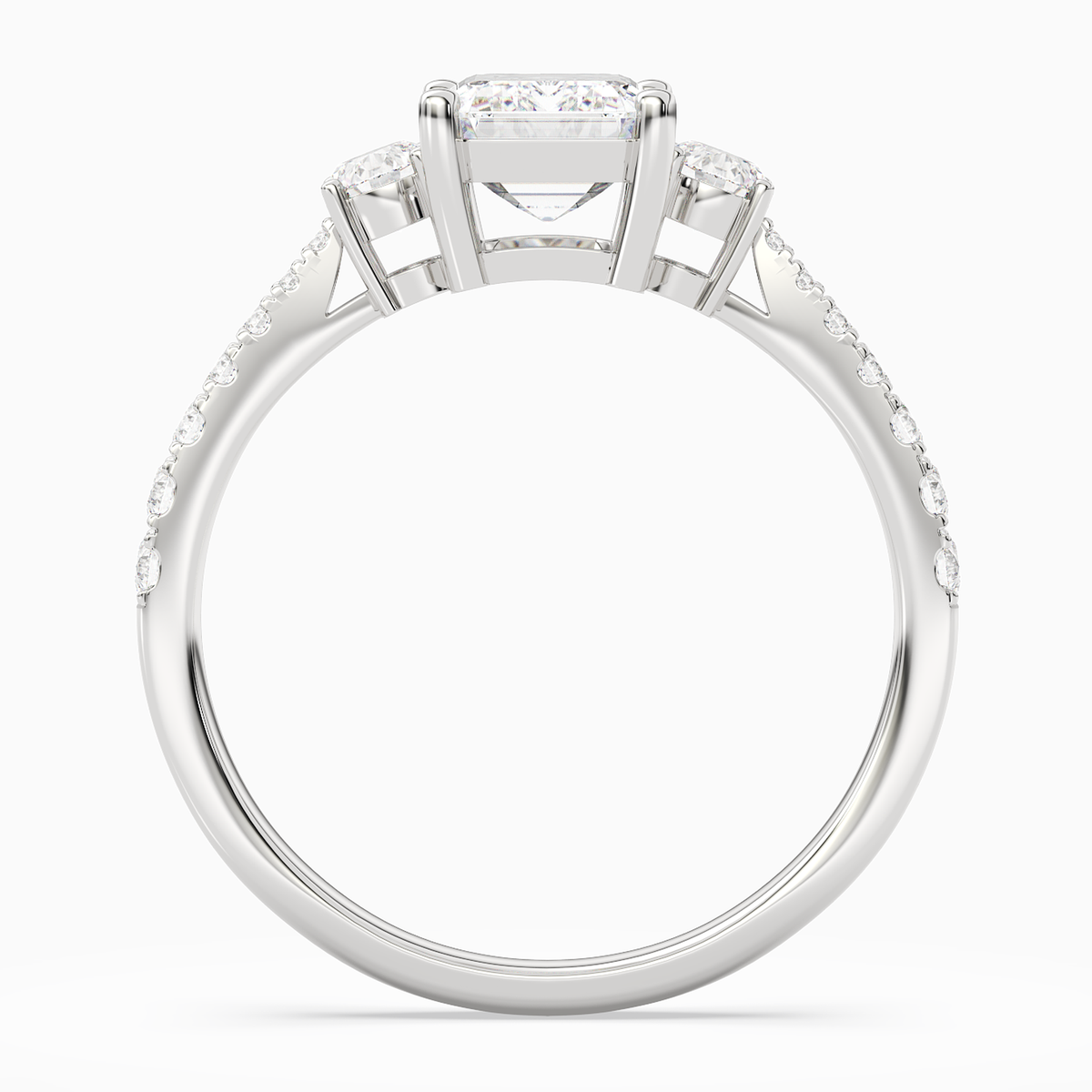 Emerald Classic Round Three Stone Pavé in 14K White Gold side profile