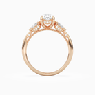 Oval Ornate Accented Three Stone in 14K Rose Gold side profile