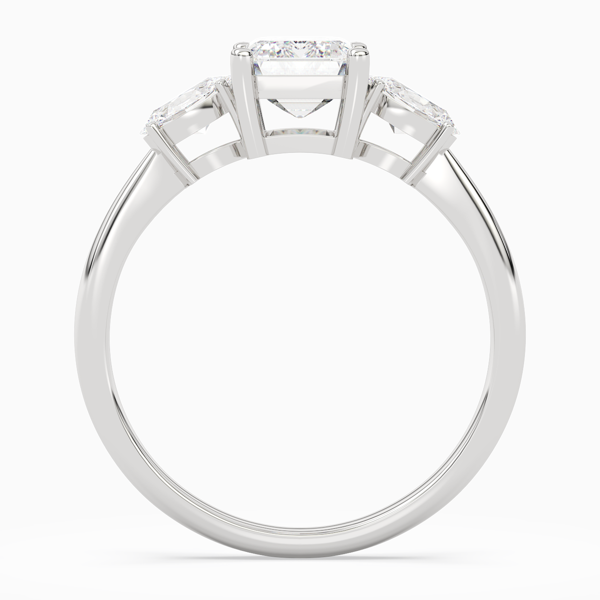 Emerald Classic Three Stone in Platinum side profile