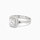 Emerald Twisted Shank Halo in 18K White Gold top angle