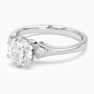 Round Milgrain Shoulder Side Stone Ring in Platinum top angle