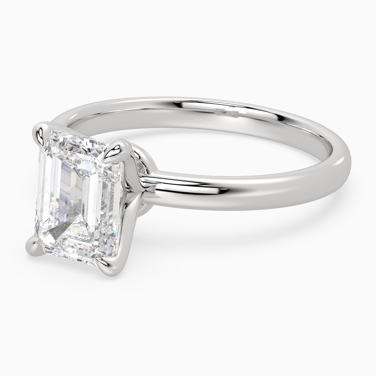 Emerald Petite Classic Solitaire in Platinum top angle