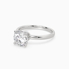 Round Petite Classic Solitaire in 18K White Gold top angle