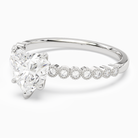 Heart Accent Shoulder Solitaire in 18K White Gold top angle