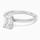 Emerald Hidden Halo Accent Plain in Platinum top angle