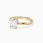 Emerald Classic Basket Plain Solitaire in 14K Yellow Gold top angle