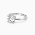 Round Classic Basket Plain Solitaire in 18K White Gold top angle
