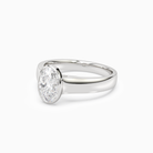 Oval Wide Tapered Bezel Solitaire in 14K White Gold top angle