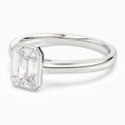 Emerald Medium Tapered Bezel Solitaire in Platinum top angle