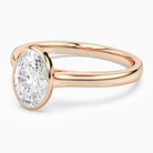 Oval Medium Tapered Bezel Solitaire in 14K Rose Gold top angle