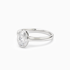 Oval Medium Tapered Bezel Solitaire in Platinum top angle