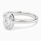 Oval Medium Tapered Bezel Solitaire in Platinum top angle