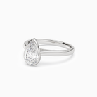 Pear Medium Tapered Bezel Solitaire in Platinum top angle