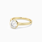 Round Medium Tapered Bezel Solitaire in 18K Yellow Gold top angle
