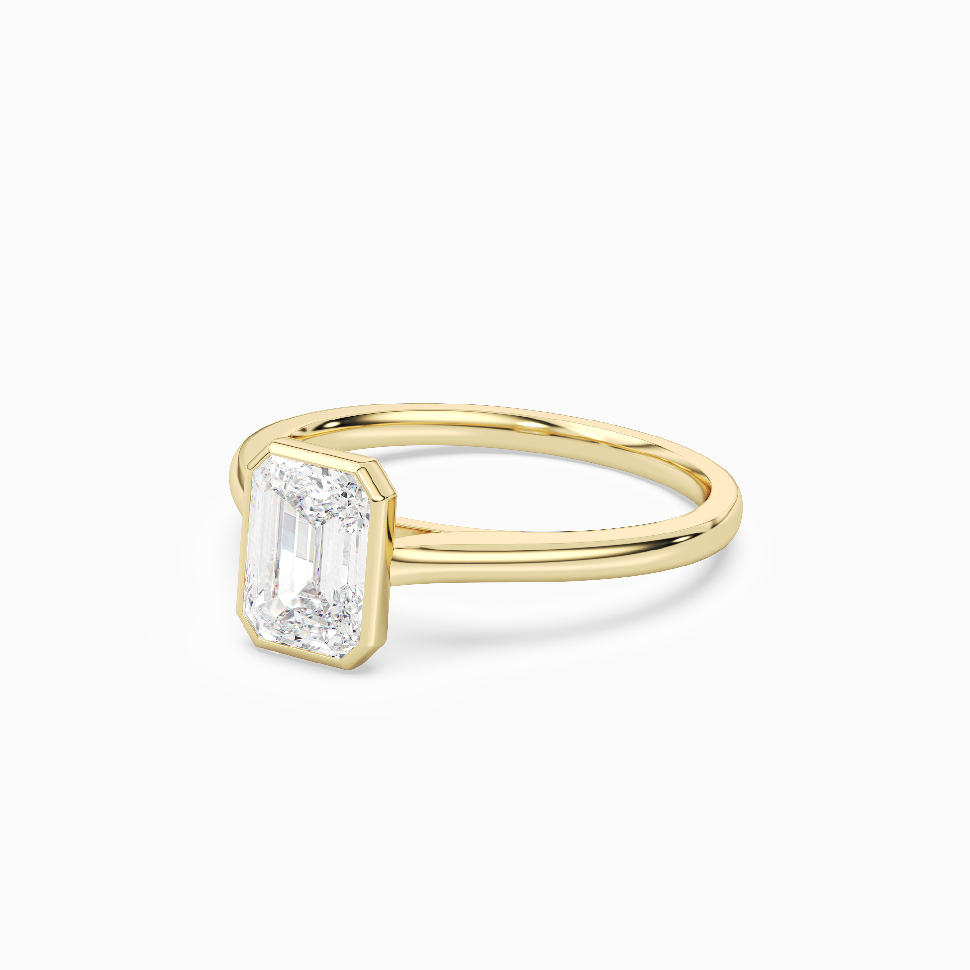 Emerald Slim Tapered Bezel Solitaire in 14K Yellow Gold top angle