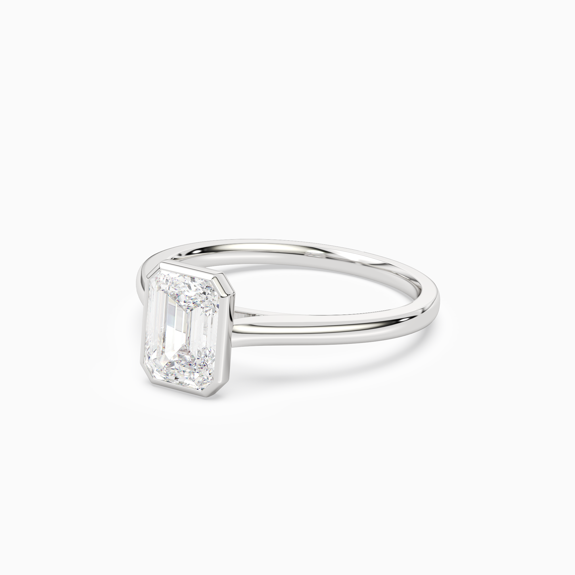 Emerald Slim Tapered Bezel Solitaire in 18K White Gold top angle