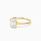 Emerald Slim Tapered Bezel Solitaire in 18K Yellow Gold top angle