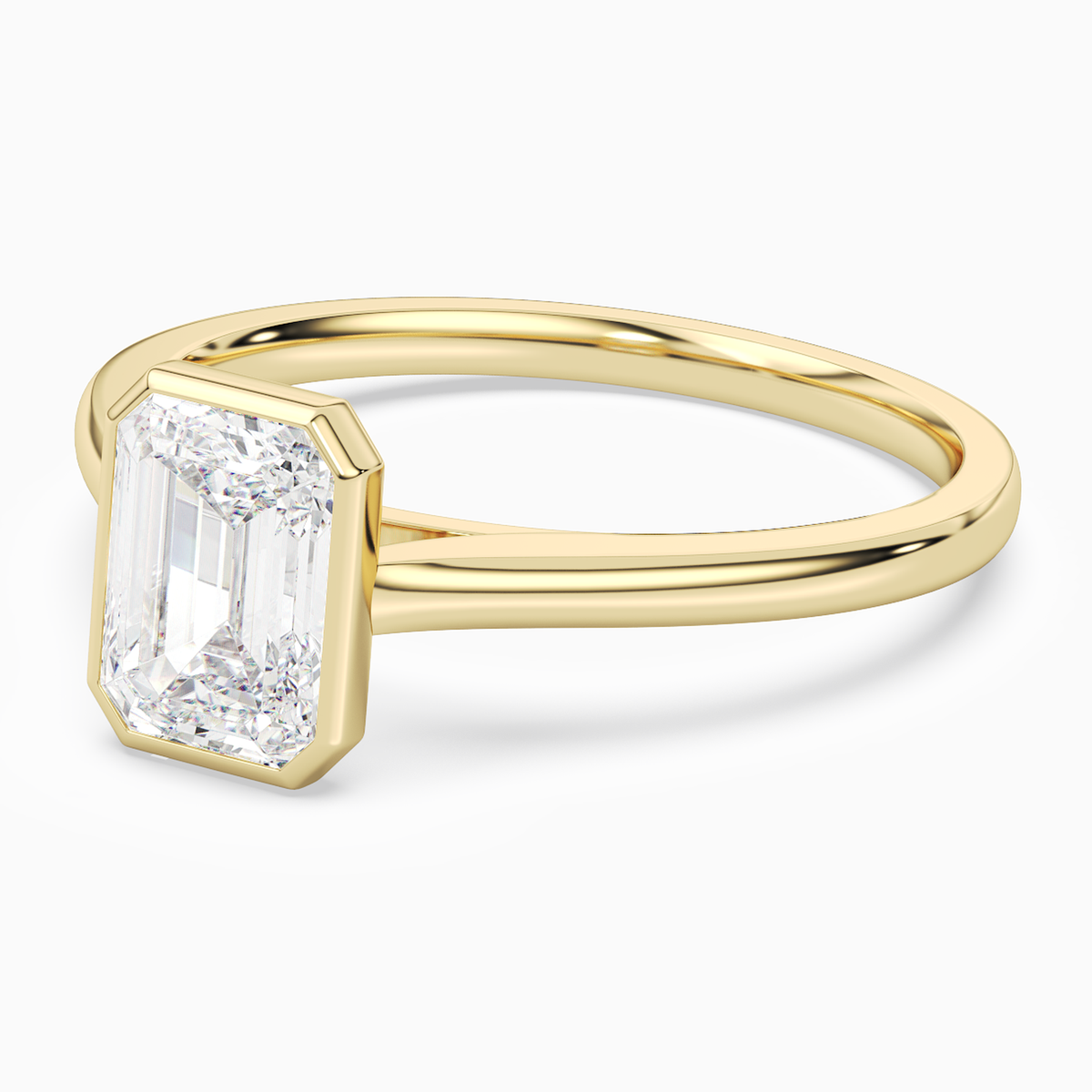 Emerald Slim Tapered Bezel Solitaire in 18K Yellow Gold top angle