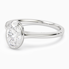Oval Slim Tapered Bezel Solitaire in Platinum top angle