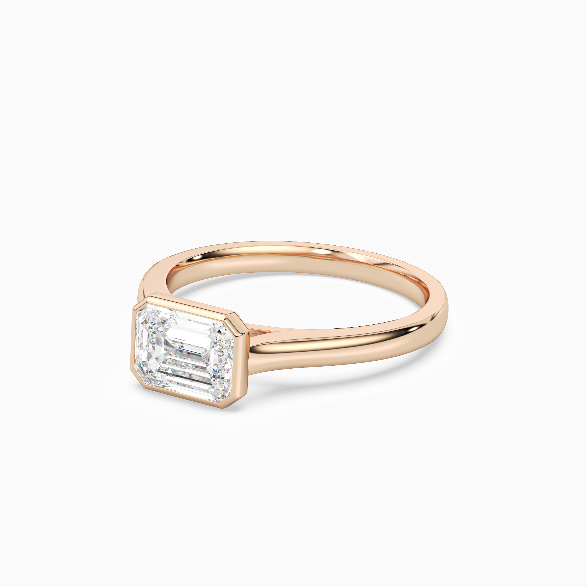 Emerald East-West Bezel Solitaire in 14K Rose Gold top angle