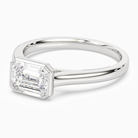Emerald East-West Bezel Solitaire in 18K White Gold top angle