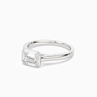 Emerald East-West Bezel Solitaire in Platinum top angle