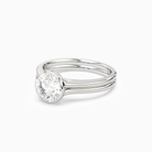Round Stacked Band Bezel Solitaire in Platinum top angle