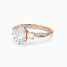 Pear Twisted Vine Three Stone in 14K Rose Gold top angle