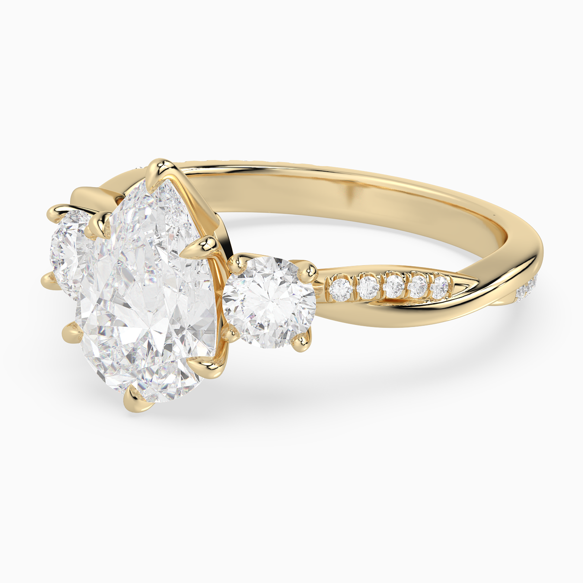 Pear Twisted Vine Three Stone in 18K Yellow Gold top angle