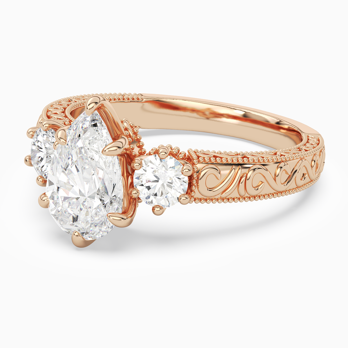 Pear Engraved Vintage Three Stone in 14K Rose Gold top angle