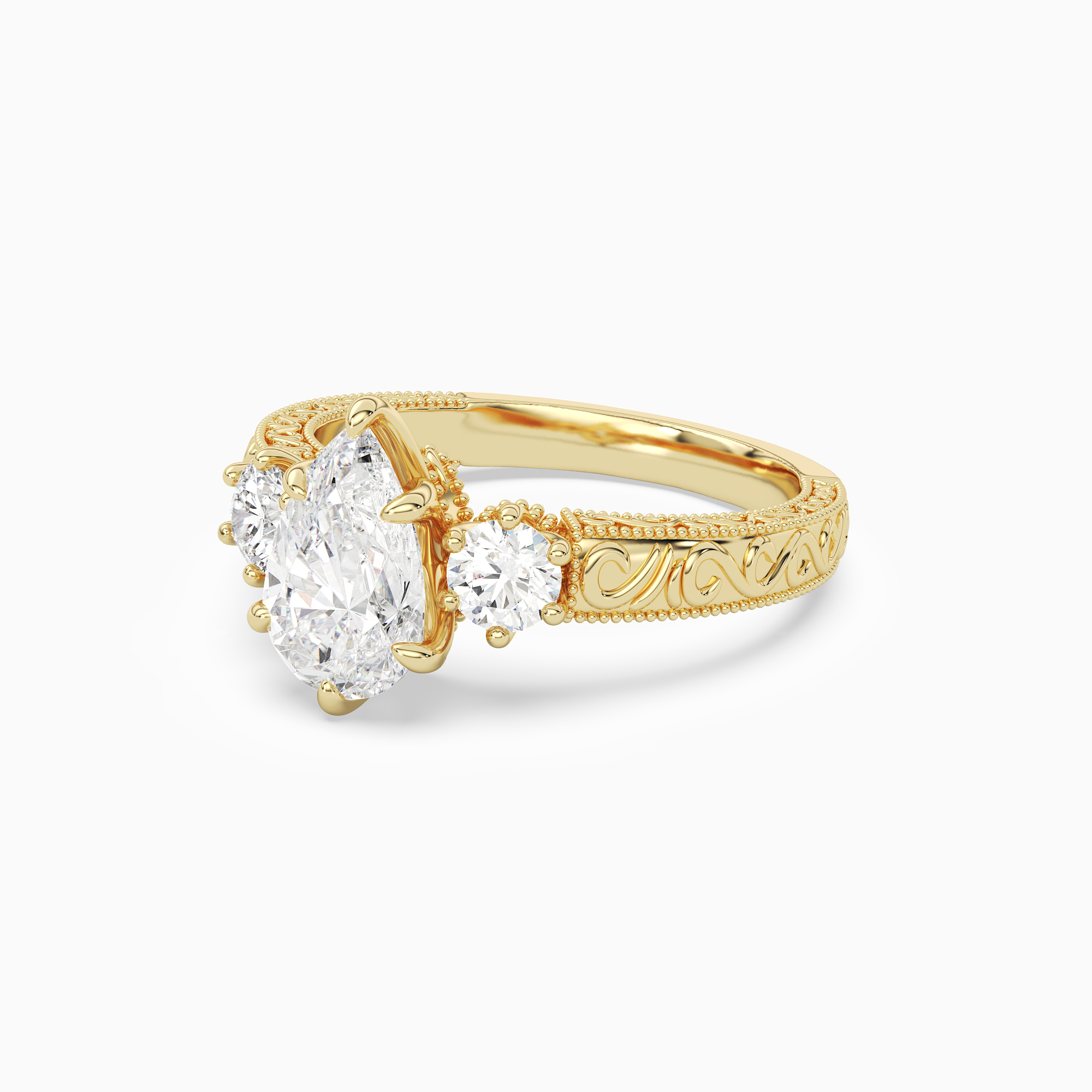 Pear Engraved Vintage Three Stone in 14K Yellow Gold top angle
