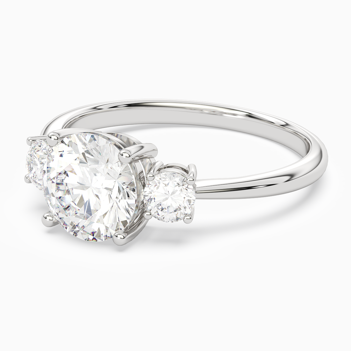 Round Classic Round Three Stone Large Sides in Platinum top angle