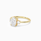 Oval Classic Round Three Stone Small Sides in 18K Yellow Gold top angle