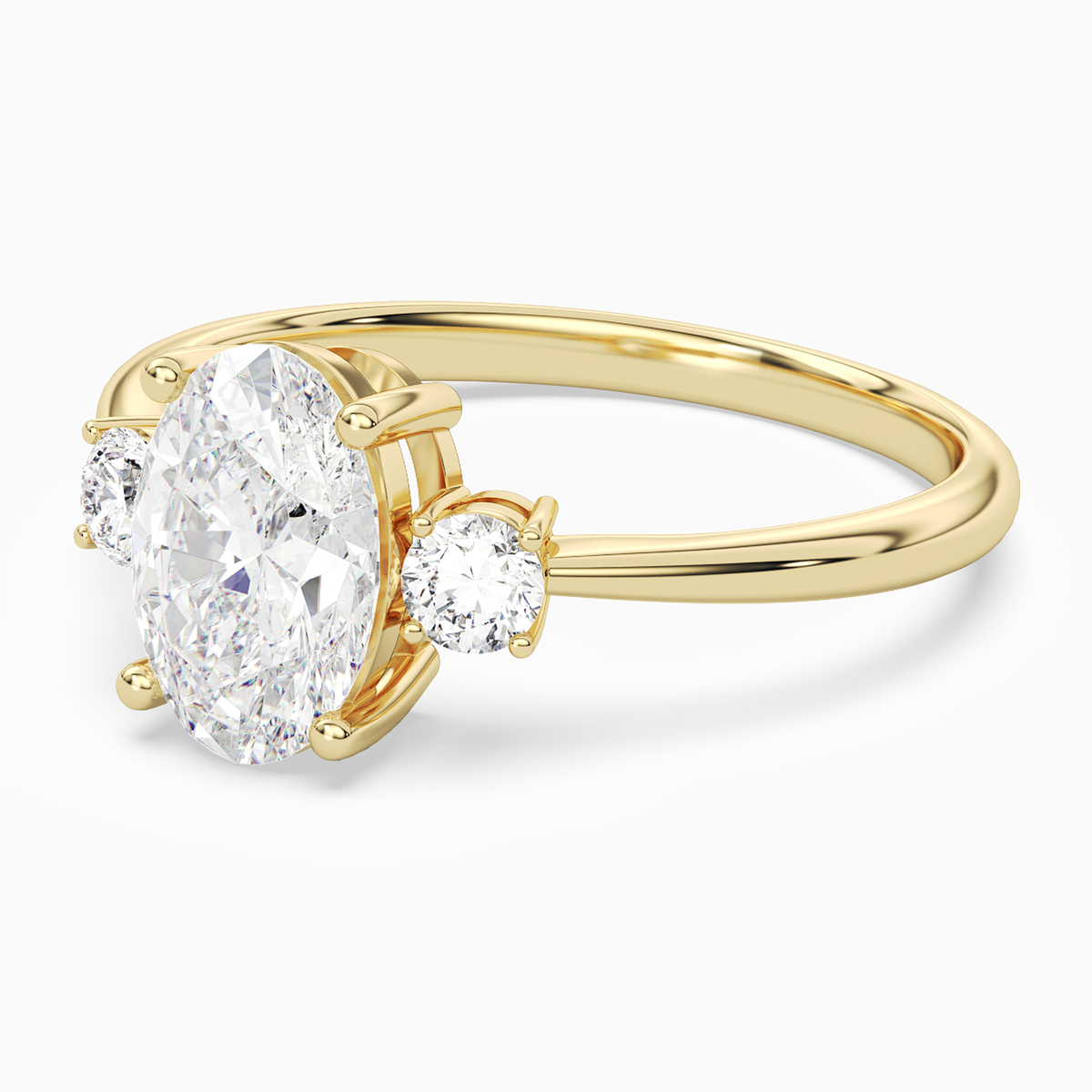 Oval Classic Round Three Stone Small Sides in 18K Yellow Gold top angle