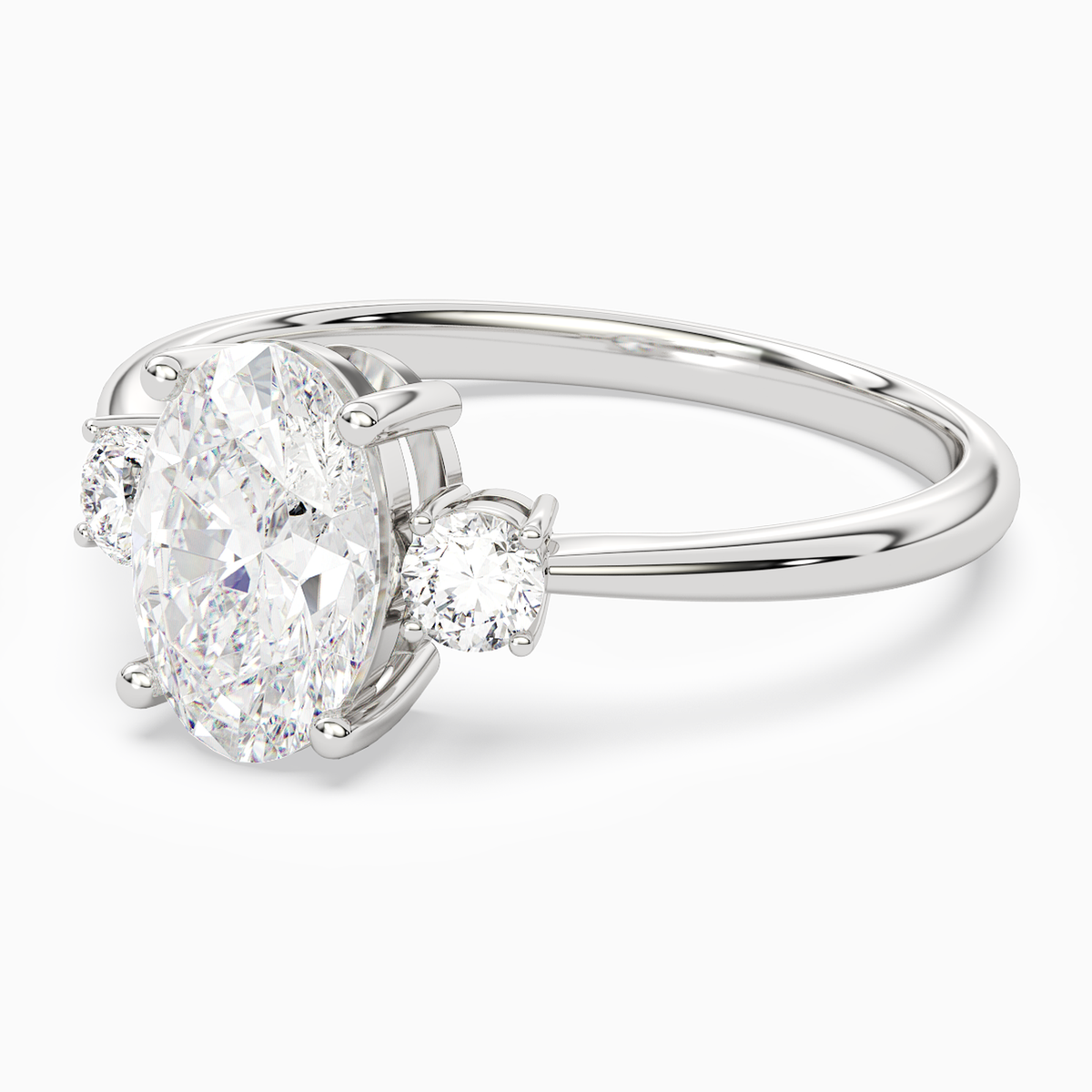 Oval Classic Round Three Stone Small Sides in Platinum top angle