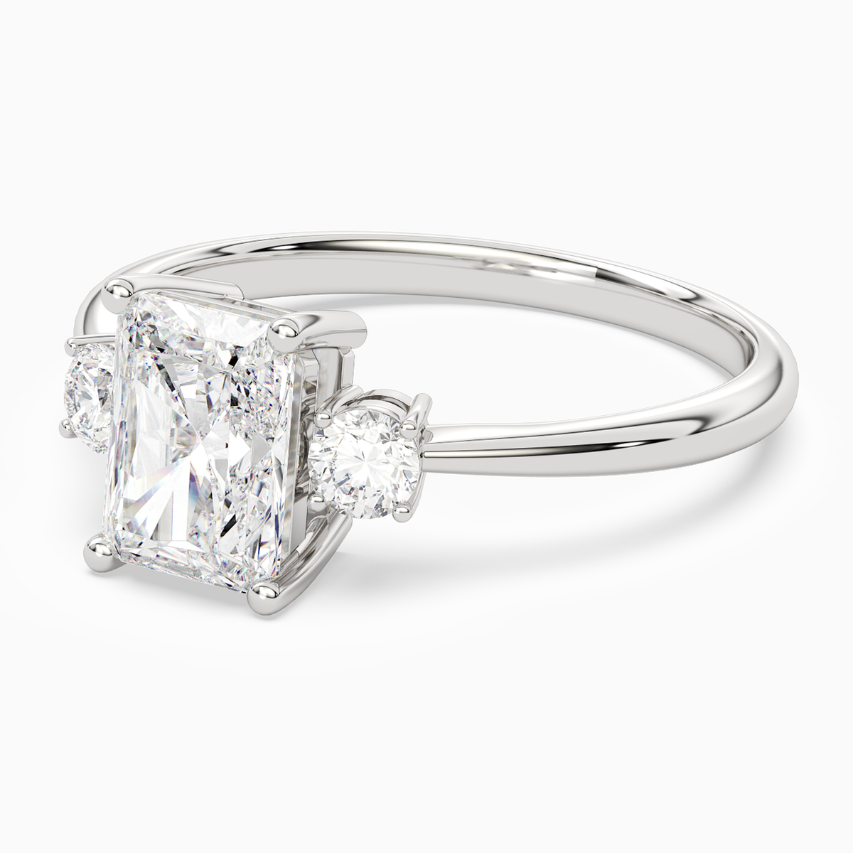Radiant Classic Round Three Stone Small Sides in 14K White Gold top angle