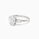 Oval Ornate Accented Three Stone in 18K White Gold top angle