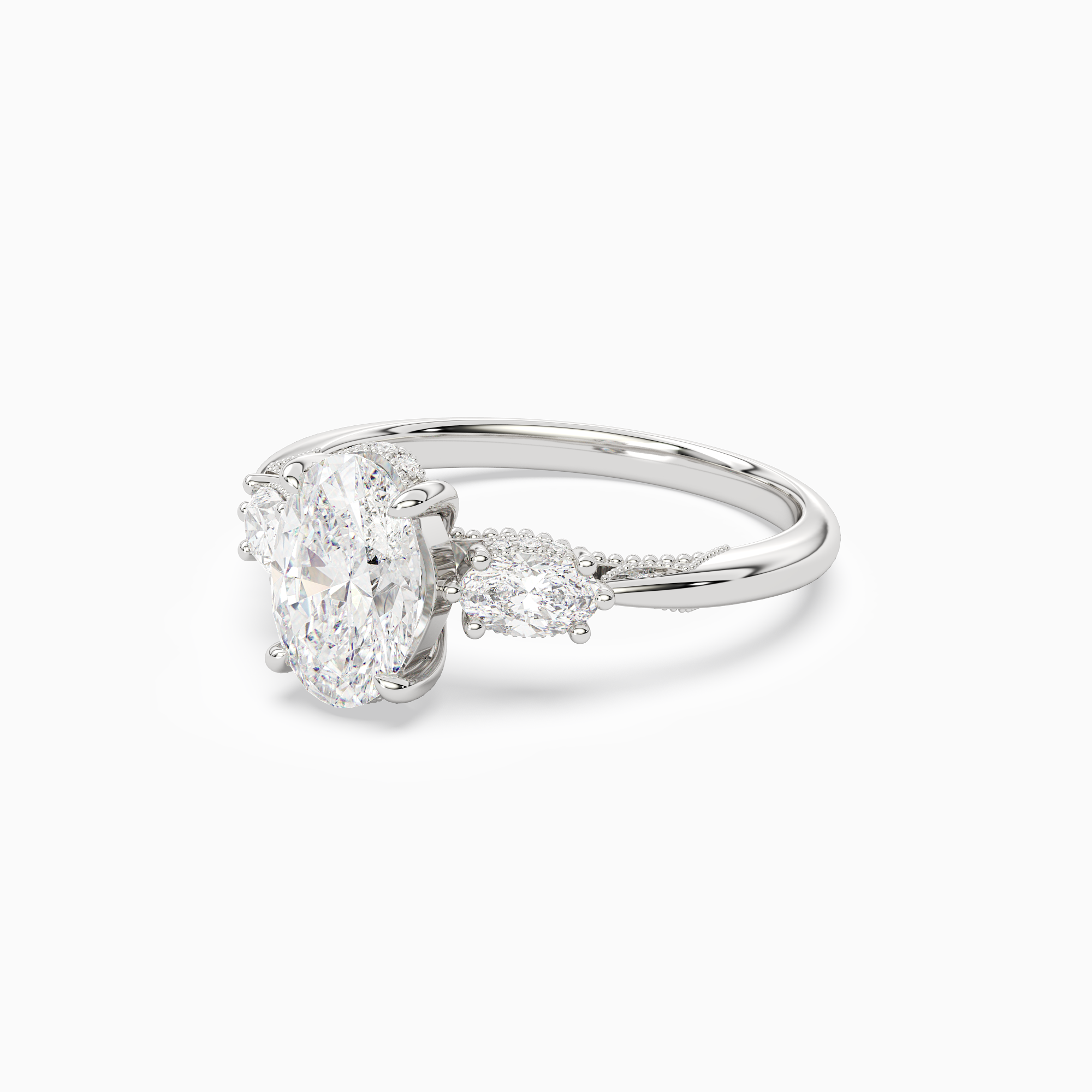 Oval Ornate Accented Three Stone in 18K White Gold top angle