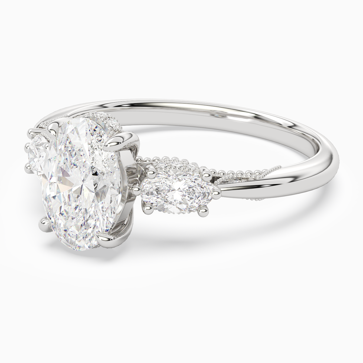 Oval Ornate Accented Three Stone in Platinum top angle