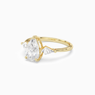 Pear Kite Side Three Stone Large Sides in 18K Yellow Gold top angle