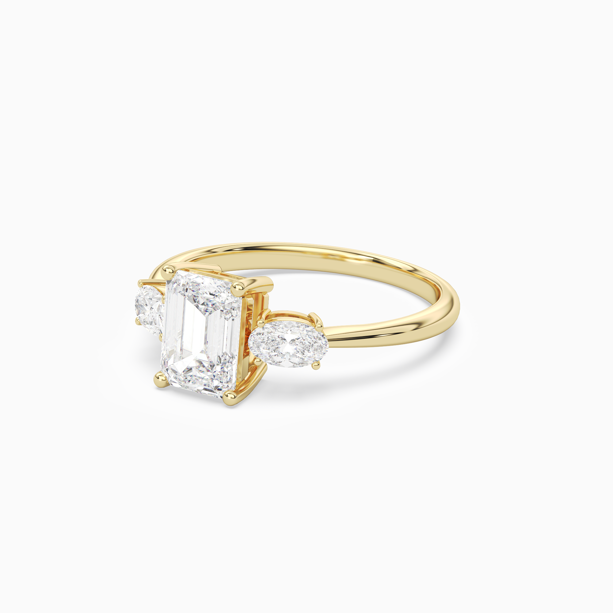 Emerald Classic Three Stone in 14K Yellow Gold top angle