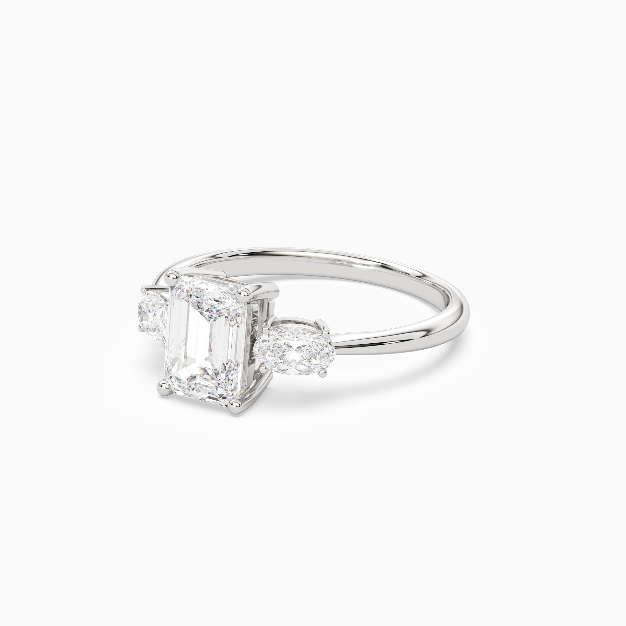 Emerald Classic Three Stone in Platinum top angle