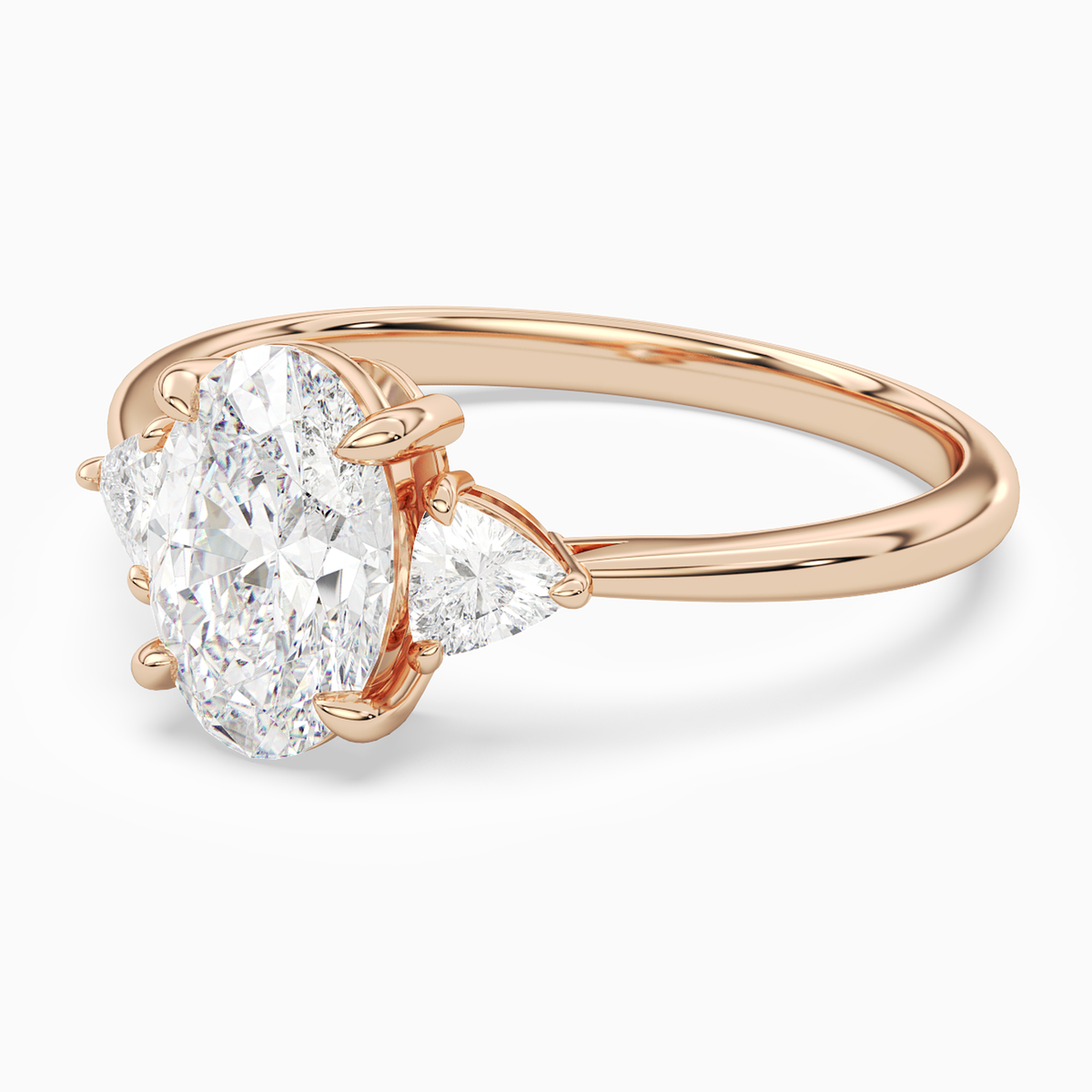 Oval Trillion Three Stone Large Sides in 14K Rose Gold top angle