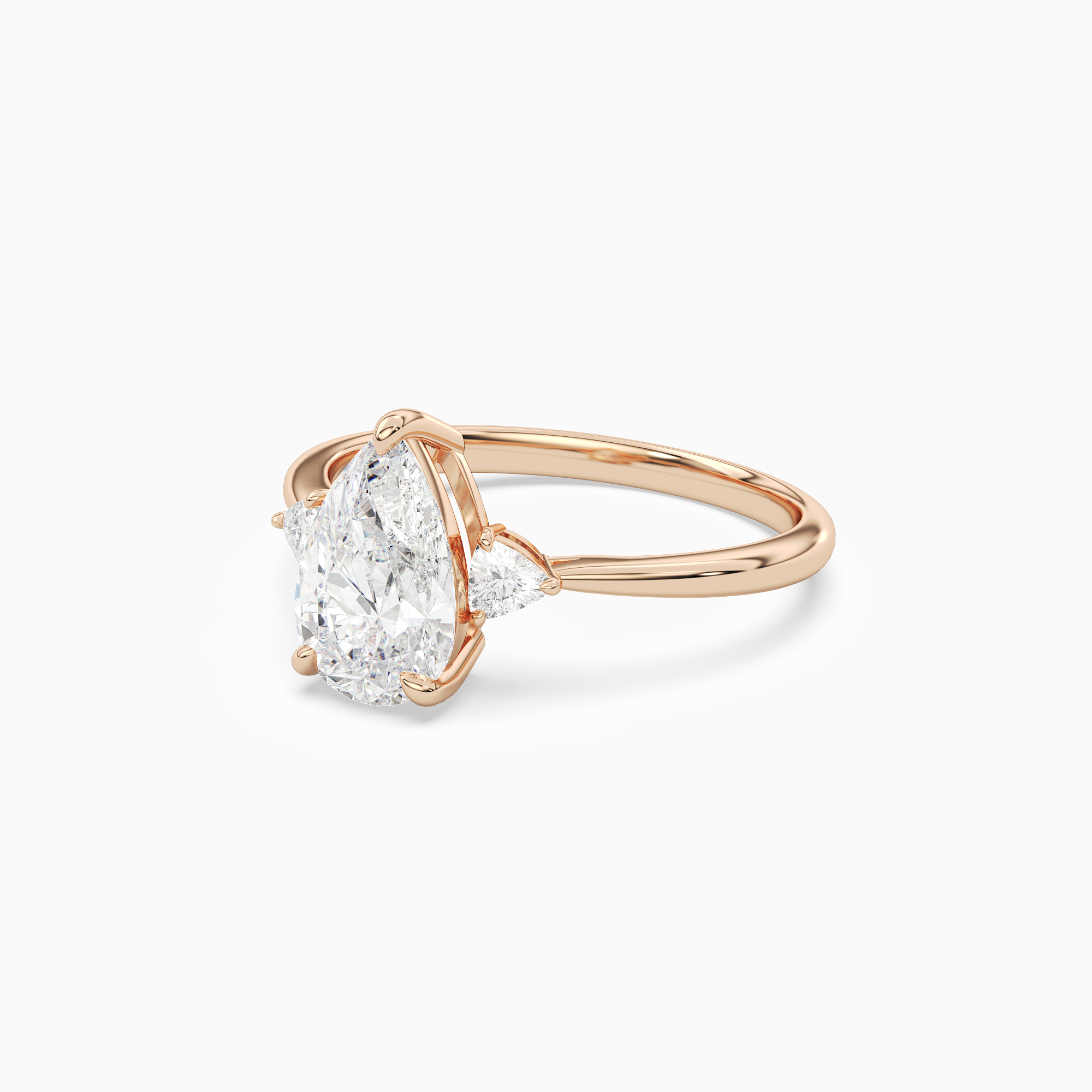 Pear Trillion Three Stone Small Sides in 14K Rose Gold top angle