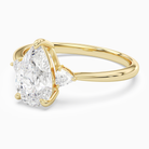 Pear Trillion Three Stone Small Sides in 14K Yellow Gold top angle